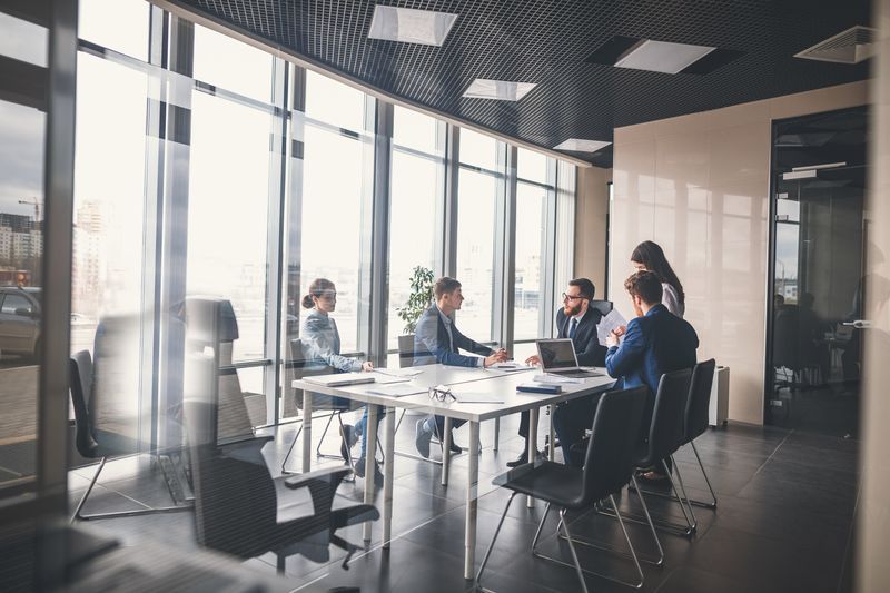 Pricing: How much do bookkeeping & HR services cost (2023) 1 business team manager meeting