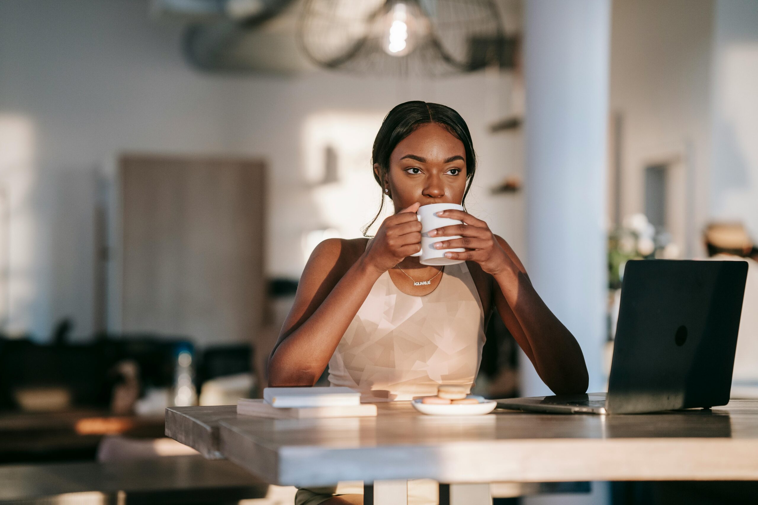 Remote employee works at local cafe